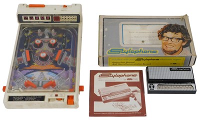Lot 591 - A Tomy Atomic arcade pinball machine, together...