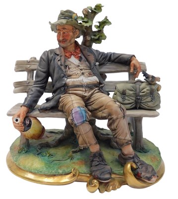 Lot 512 - A Capodimonte figure, modelled as a tramp...