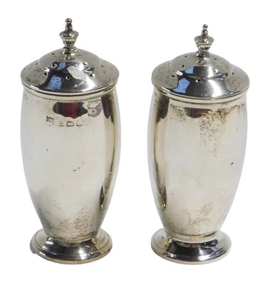 Lot 607 - A pair of George VI silver pepper pots, of...
