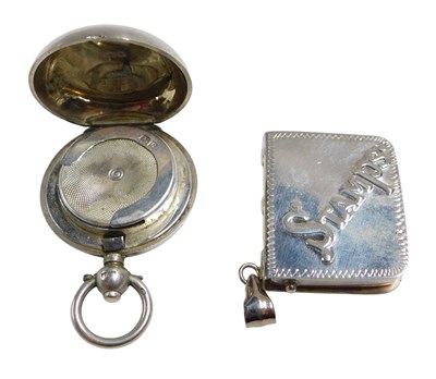 Lot 613 - An Edward VII silver sovereign case, initial...