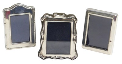 Lot 616 - Three silver mounted strut photograph frames,...