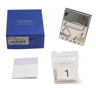 Lot 619 - A silver mounted desk calendar, with removable...