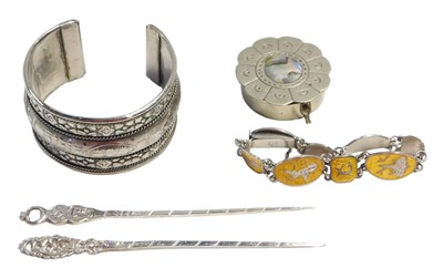 Lot 634 - A group of white metal items, comprising an...