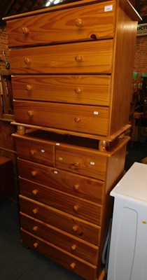Lot 1004 - Two pine finished chests of drawers, one with...