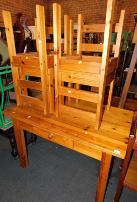Lot 1007 - A pine finished kitchen table, with drawer to...