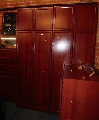 Lot 1024 - A bedroom suite, consisting of two double door...