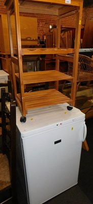 Lot 1041 - A small pine kitchen unit, with various...