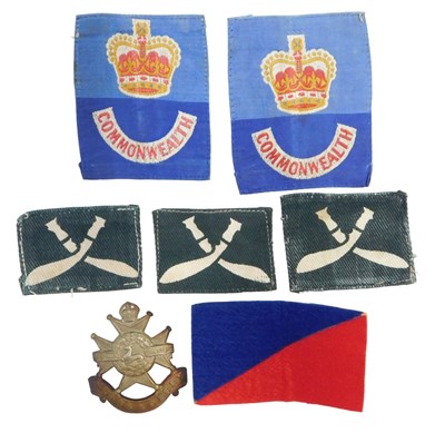 Lot 675 - A group of cloth badges, comprising three for...