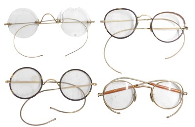 Lot 685 - A group of early 20thC wire framed spectacles.