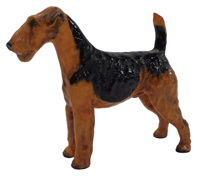 Lot 710 - A Royal Doulton figure modelled as an Airedale...