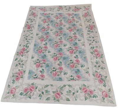 Lot 741 - A woolwork bed throw, decorated with pink...