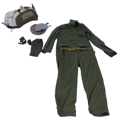 Lot 745 - A military issue parachute, in a green canvas...