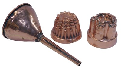 Lot 748 - A group of copperware, comprising two jelly...