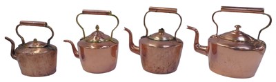 Lot 749 - Four Victorian copper kettles, the...