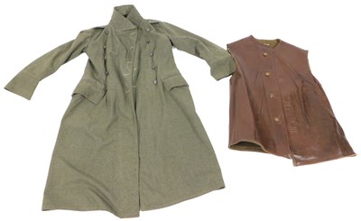Lot 777 - A WWII Army great coat, numbered 100, dated...