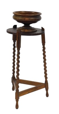 Lot 789 - An early 20thC oak jardiniere stand, the...