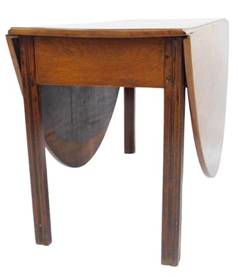 Lot 808 - A George III mahogany drop leaf dining table,...