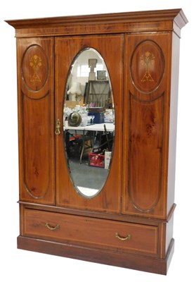 Lot 856 - An Edwardian mahogany and inlaid wardrobe, the...