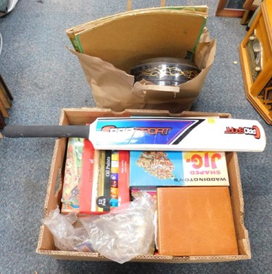 Lot 2126 - A group of jigsaw puzzles, oil paints, books,...