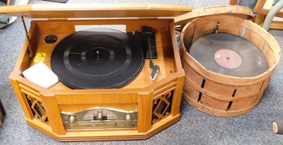 Lot 2127 - A retro style record player and radio, and a...