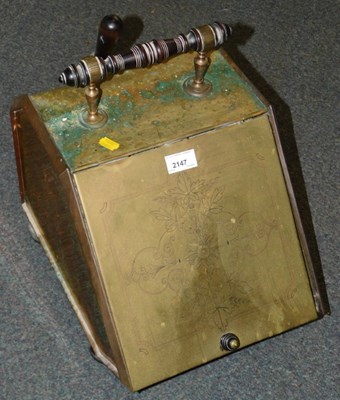 Lot 2147 - A brass coal purdonium, with scoop to back,...