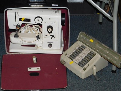 Lot 2153 - A Crownpoint electric sewing machine, together...