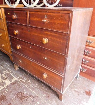 Lot 1076 - A 19thC oak chest, of two short over three...