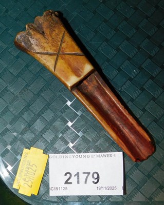 Lot 2179 - A hand carved ox bone apple corer or cheese...