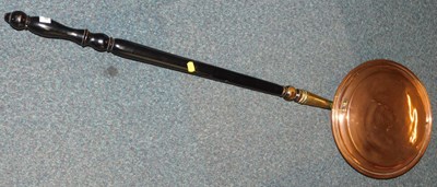Lot 2200 - A copper warming pan, with wooden handle.