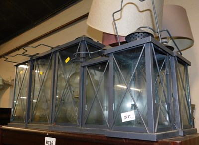 Lot 2221 - Four hanging lanterns.