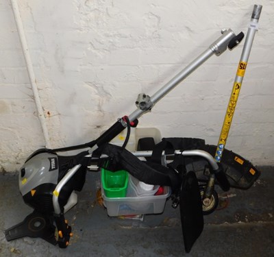 Lot 1089 - A Titan petrol strimmer and accessories.