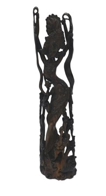 Lot 85A - A Balinese carved wooden figure of a Legong...