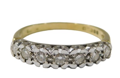 Lot 81 - An 18ct gold diamond half hoop dress ring, set...